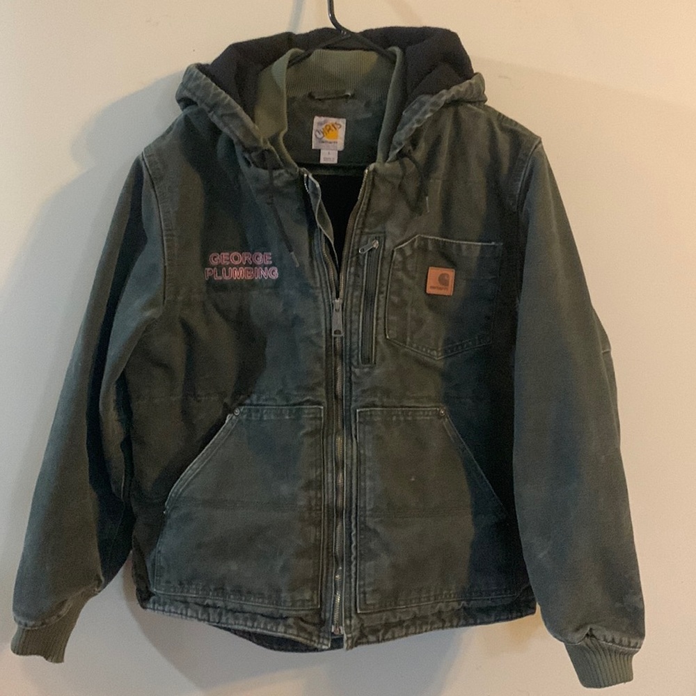 Dark gray men’s  Carhartt hooded jacket size Lg. Has George Plumbing embroider.
